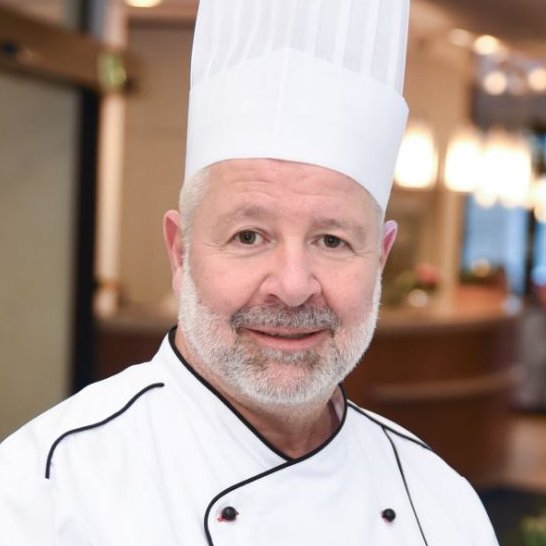 Porträtaufnahme des Küchenchefs Georg Friedrich Honvehlmann